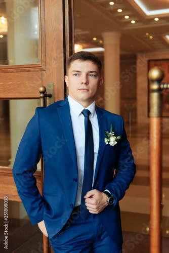 the groom in a wedding suit, a man preparing for the wedding 1