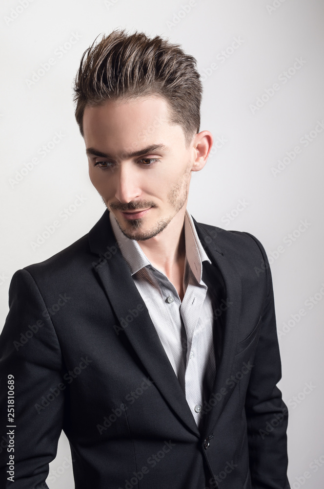 Handsome young elegant man in costume. Handsome young elegant man in costume.