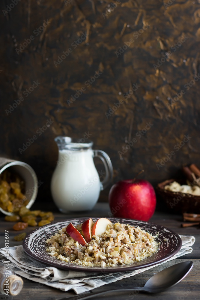 Buckwheat porridge with milk, apple, raisins and cashew nuts Buckwheat porridge with milk, apple, raisins and cashew nuts