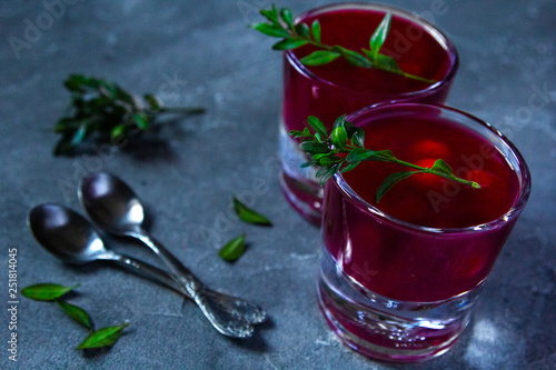 Cherry Kissel or kisel - Russian traditional sweet drink, in two glasses photo