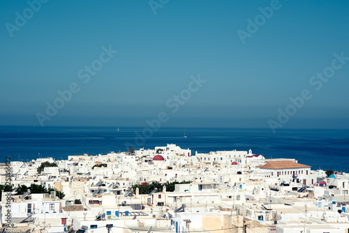 Mediterranean city against blue sea bird's-eye view. Mykonos, Greece