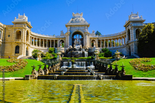 Marseille. Palais de Longchamp with fountains and sculptures in sunny day.