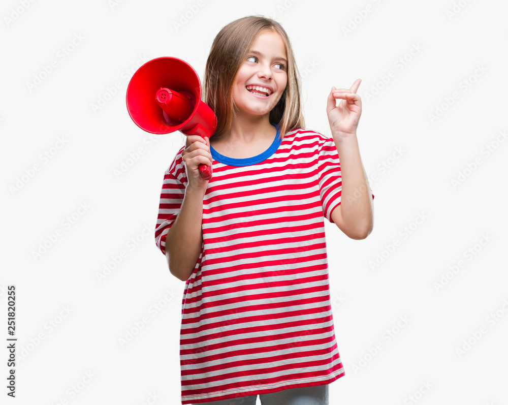 Young beautiful girl yelling through megaphone over isolated background very happy pointing with hand and finger to the side Young beautiful girl yelling through megaphone over isolated background very happy pointing with hand and finger to the side