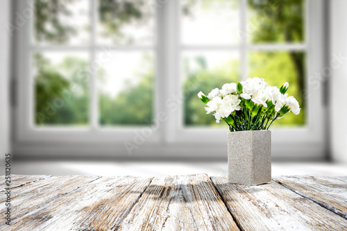 Desk of free space and fresh flowers. 