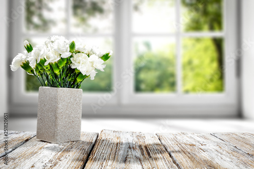 Desk of free space and fresh flowers. 