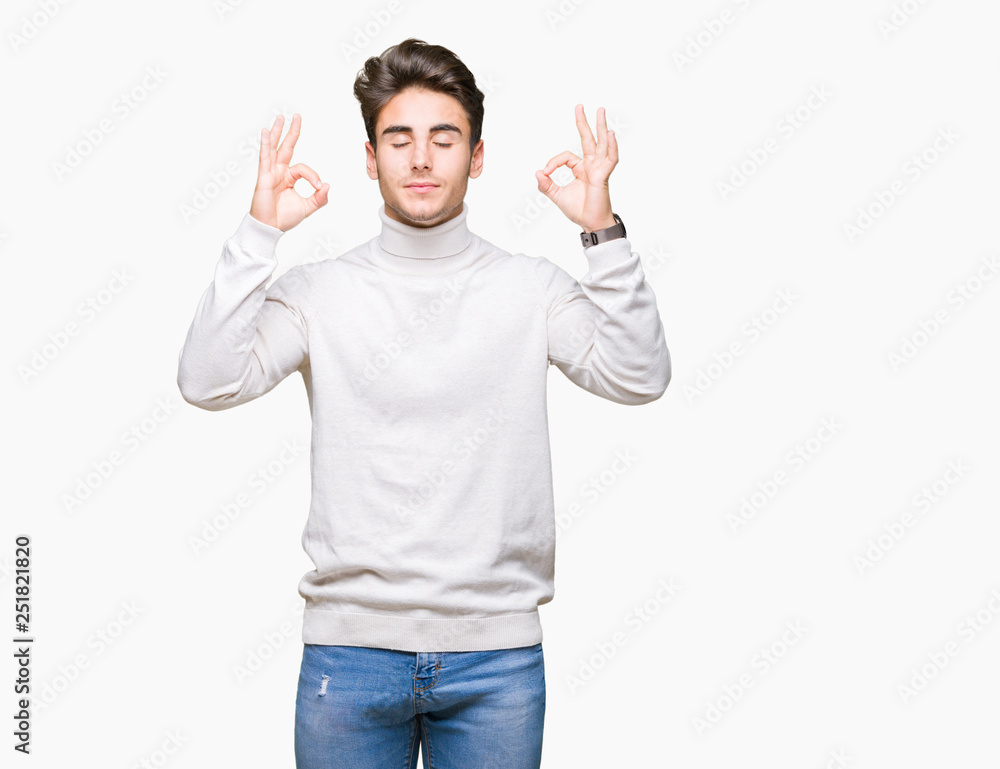 Young handsome man wearing turtleneck sweater over isolated background relax and smiling with eyes closed doing meditation gesture with fingers. Yoga concept. Young handsome man wearing turtleneck sweater over isolated background relax and smiling with eyes closed doing meditation gesture with fingers. Yoga concept.