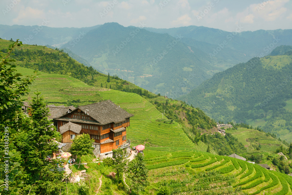 Beautiful view of the houses of the village of Dazhay, rice terraces and mountains. 