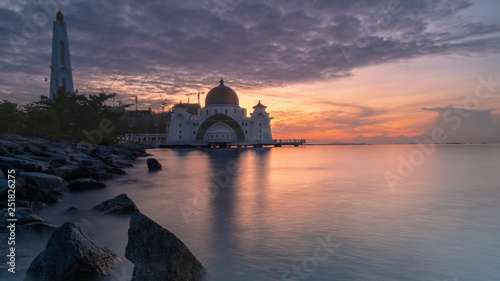 beautiful sunrise at malacca straits mosque