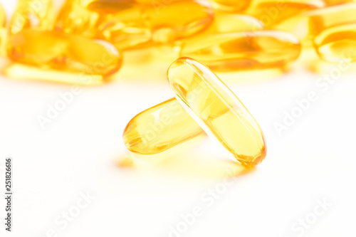 fish oil capsules isolated on white