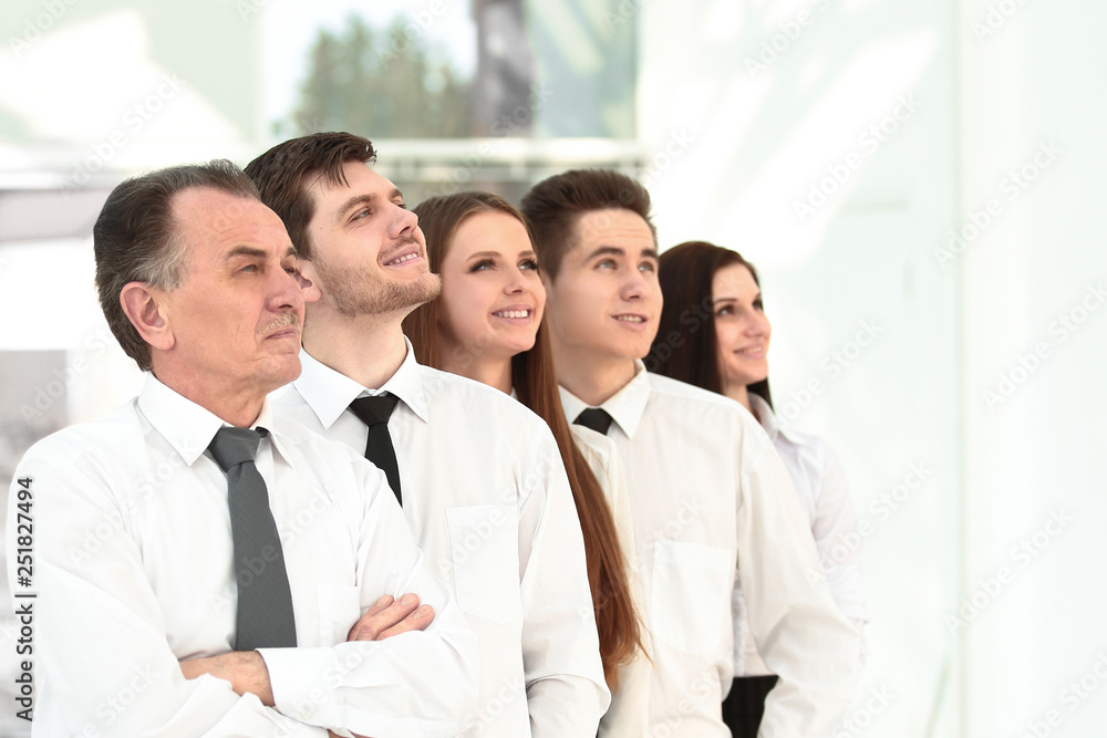 successful business team looking at copy space. successful business team looking at copy space.