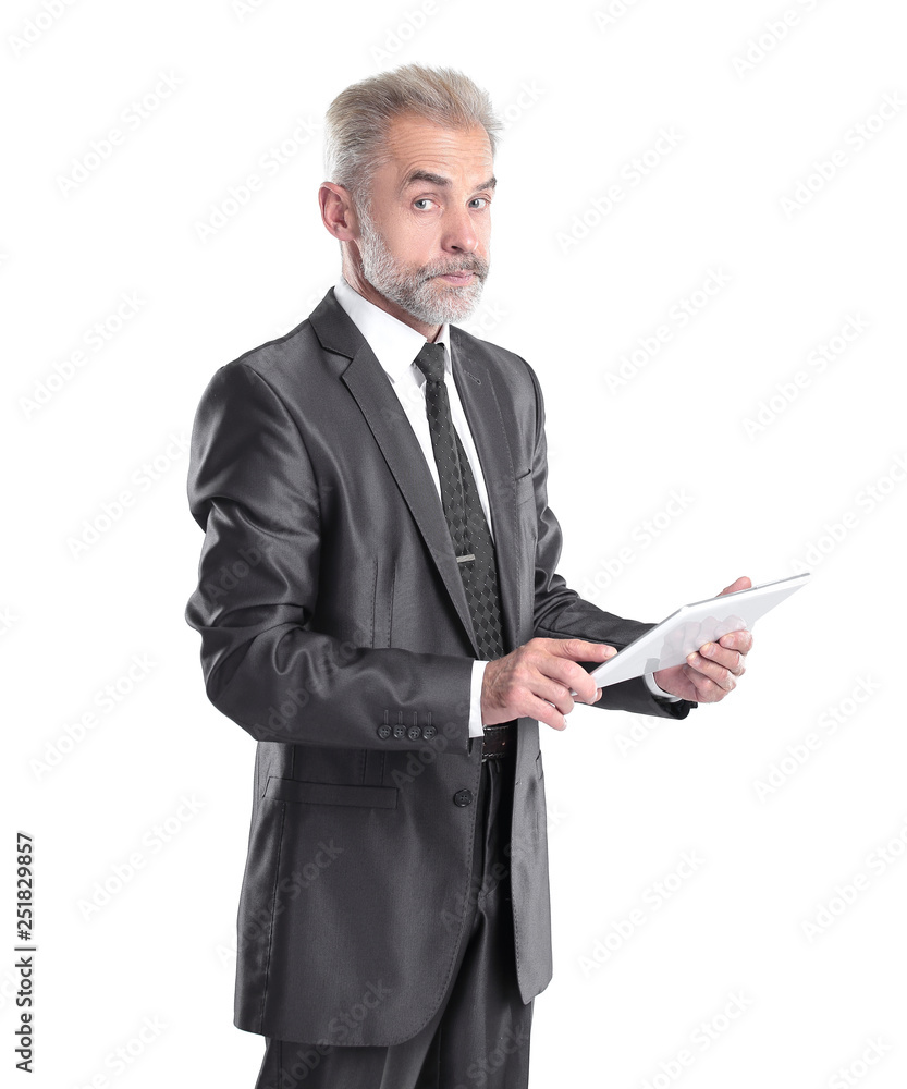 modern businessman reading text on a digital tablet.isolated on grey background modern businessman reading text on a digital tablet.isolated on grey background