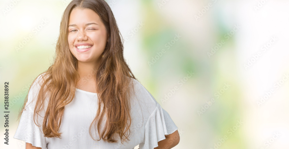 Young beautiful brunette business woman over isolated background winking looking at the camera with sexy expression, cheerful and happy face. Young beautiful brunette business woman over isolated background winking looking at the camera with sexy expression, cheerful and happy face.
