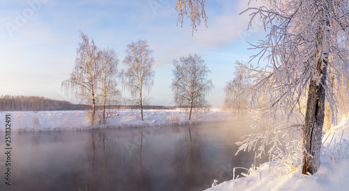 panorama of dawn on Reftinsky reservoir in winter, Russia Ural, February