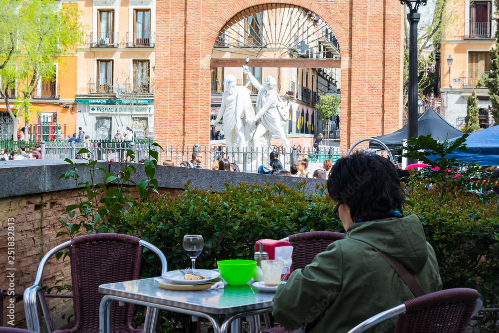 Woman having breakfast at Malasaña., Madrid, Spain