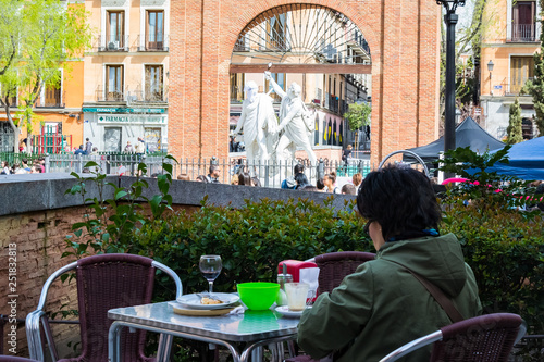Woman having breakfast at Malasaña., Madrid, Spain