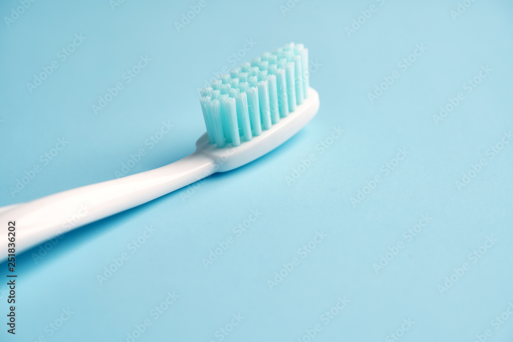 Toothbrushes on color table Toothbrushes on color table
