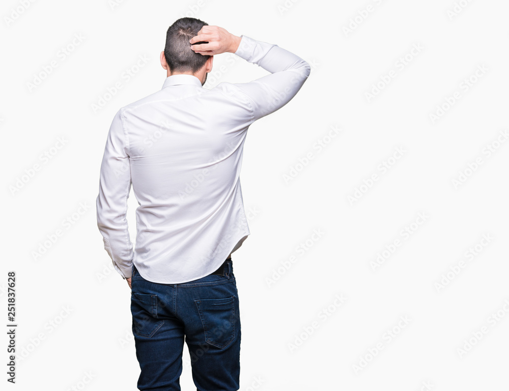 Young handsome business man wearing glasses over isolated background Backwards thinking about doubt with hand on head Young handsome business man wearing glasses over isolated background Backwards thinking about doubt with hand on head