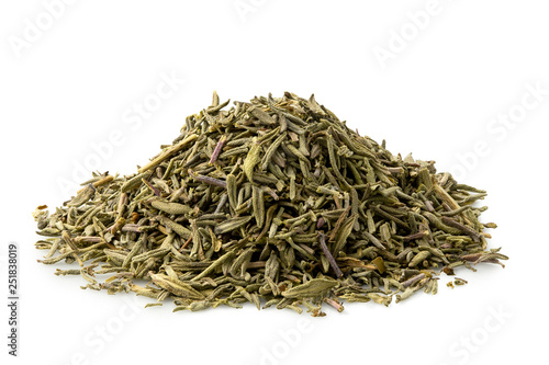 A pile of dried rubbed thyme isolated on white.