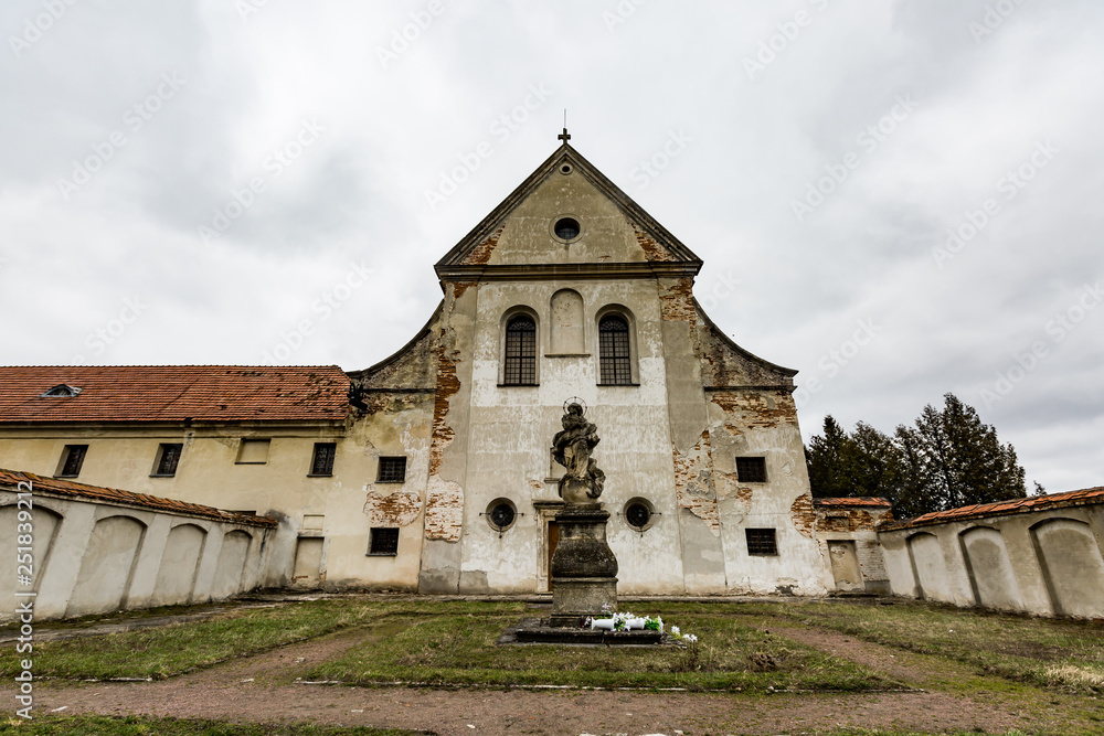 View of the old Capuchin monastry in Ukraine against a cloudy sky