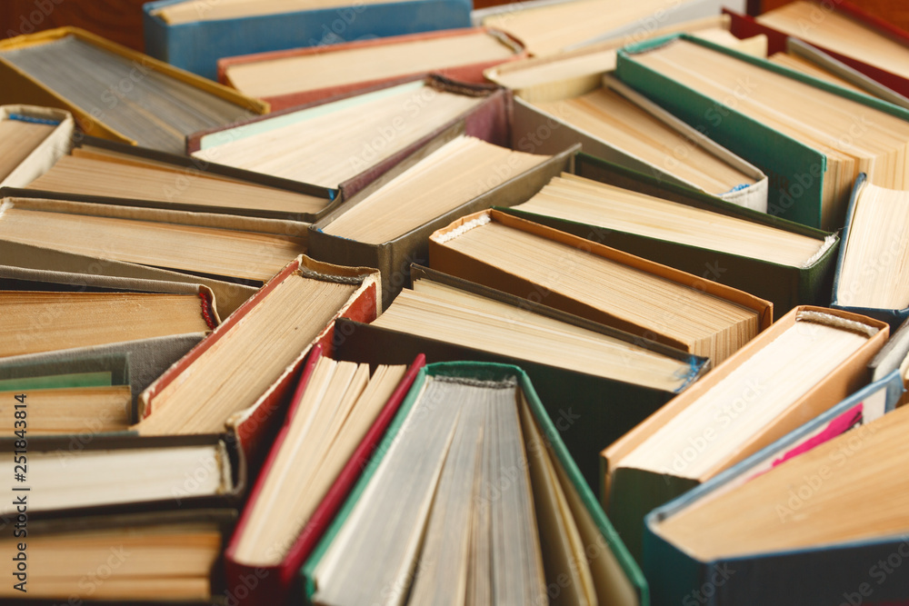 Fototapeta premium Old hardback books background. education background.