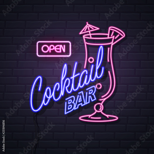 Neon sign cocktail bar on brick wall background. Vintage electric signboard. photo