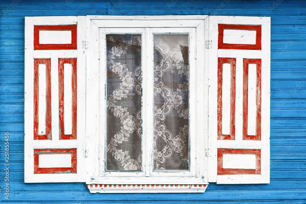 Wooden rustic window in small cottage house. Vintage wall with ...