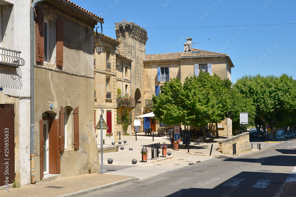 Obraz premium Village and rest of rampart of Remoulins, a commune in the Gard department in southern France.