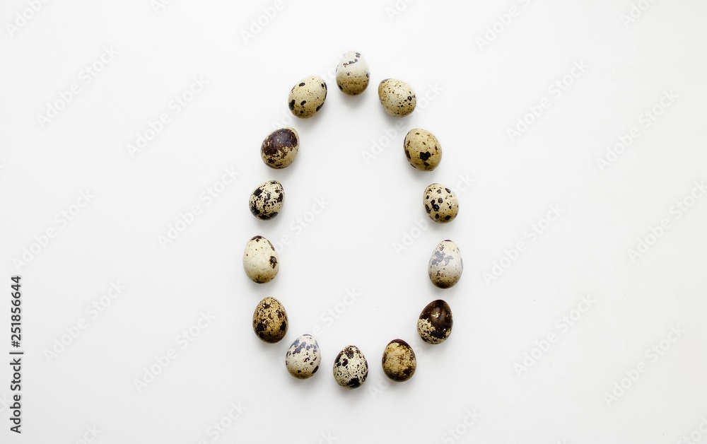 Quail eggs are on a white background there is a place for an inscription Quail eggs are on a white background there is a place for an inscription