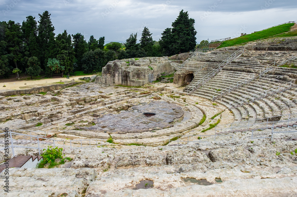 Ancient Greek amphitheater in historic city Syracuse on the island of Sicily