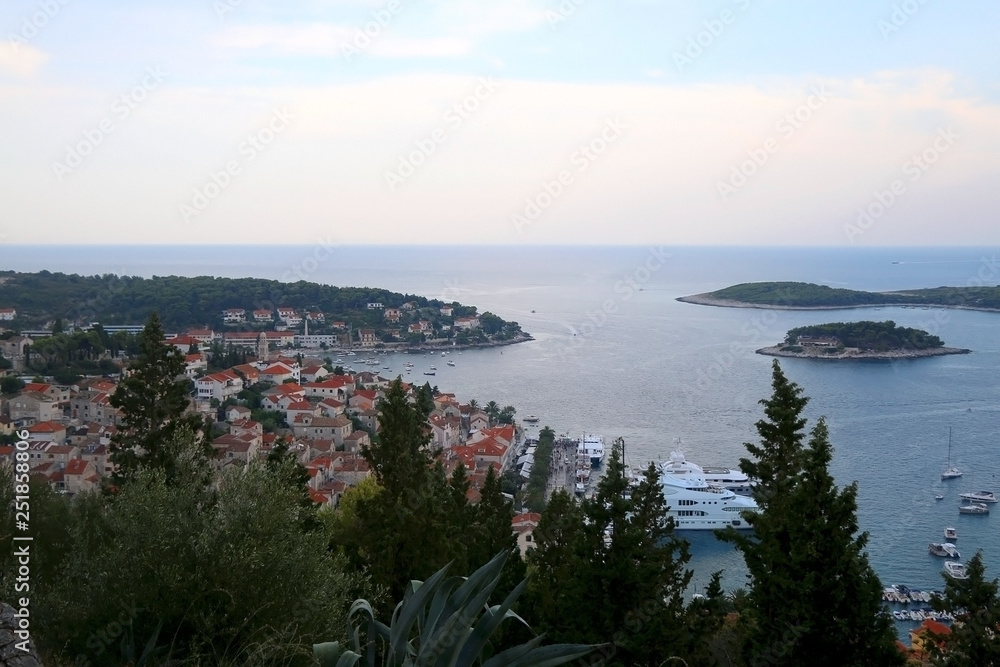 Promenade and archipelago in town Hvar, on island Hvar, Croatia. Hvar is popular usmmer travel destination.