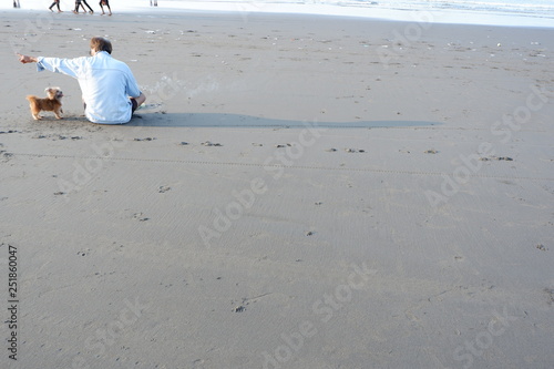 someone who is praying on the beach
