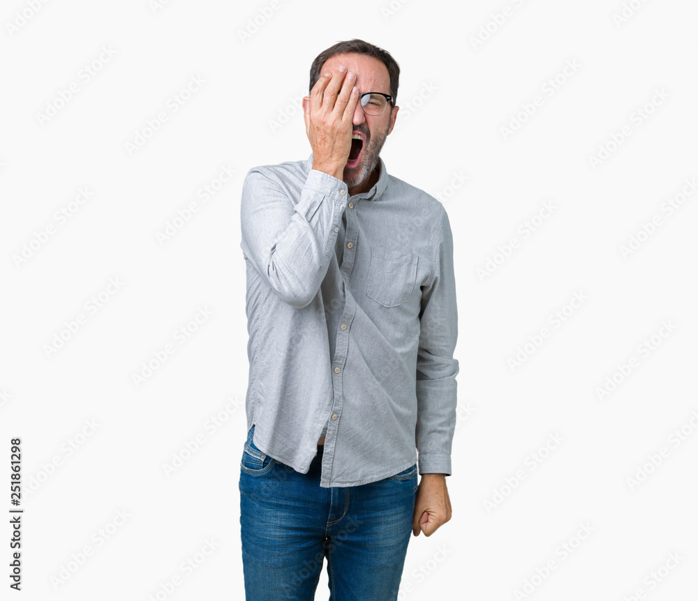 Handsome middle age elegant senior man wearing glasses over isolated background Yawning tired covering half face, eye and mouth with hand. Face hurts in pain. Handsome middle age elegant senior man wearing glasses over isolated background Yawning tired covering half face, eye and mouth with hand. Face hurts in pain.