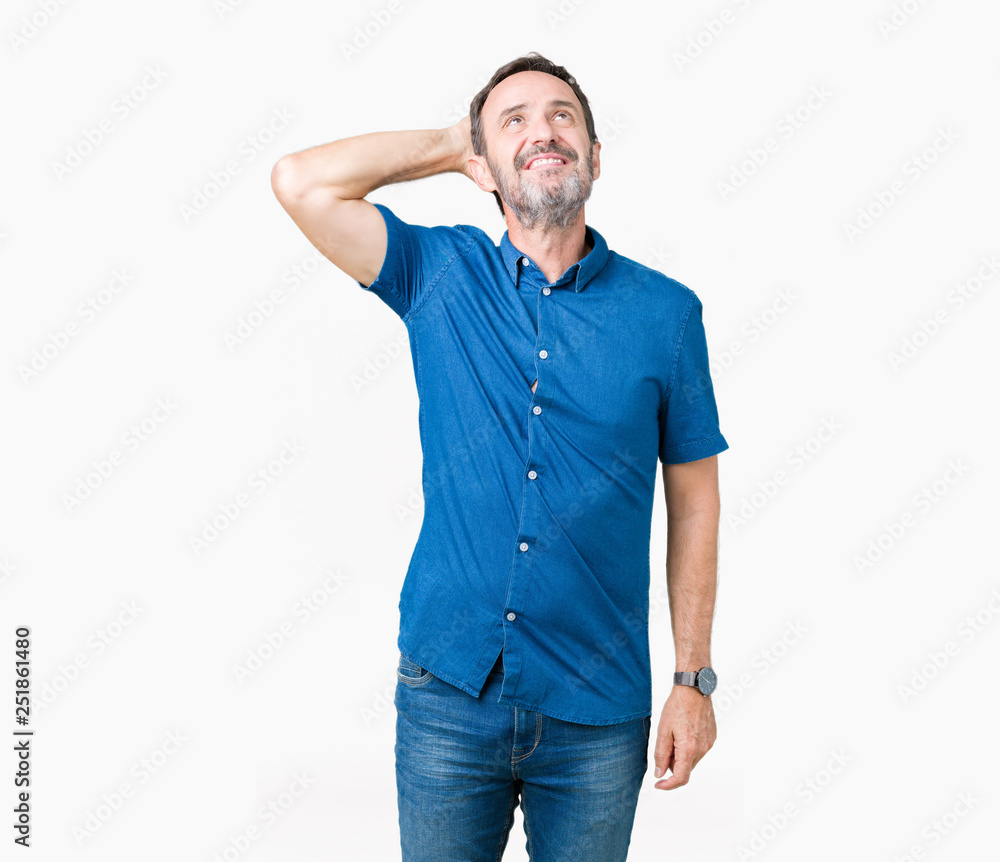 Handsome middle age elegant senior man over isolated background Smiling confident touching hair with hand up gesture, posing attractive Handsome middle age elegant senior man over isolated background Smiling confident touching hair with hand up gesture, posing attractive