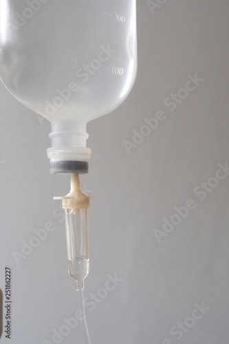 Close photos of saline bottles in the hospital on a white background