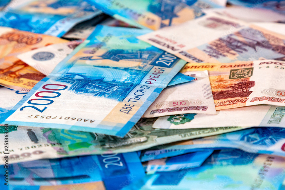 Russian cash money 5000, 2000, 1000, 500 lying on plane. Rubles banknote as background, closeup Russian cash money 5000, 2000, 1000, 500 lying on plane. Rubles banknote as background, closeup