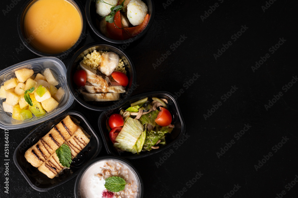 ready meal to eat into plastic food boxes, top view