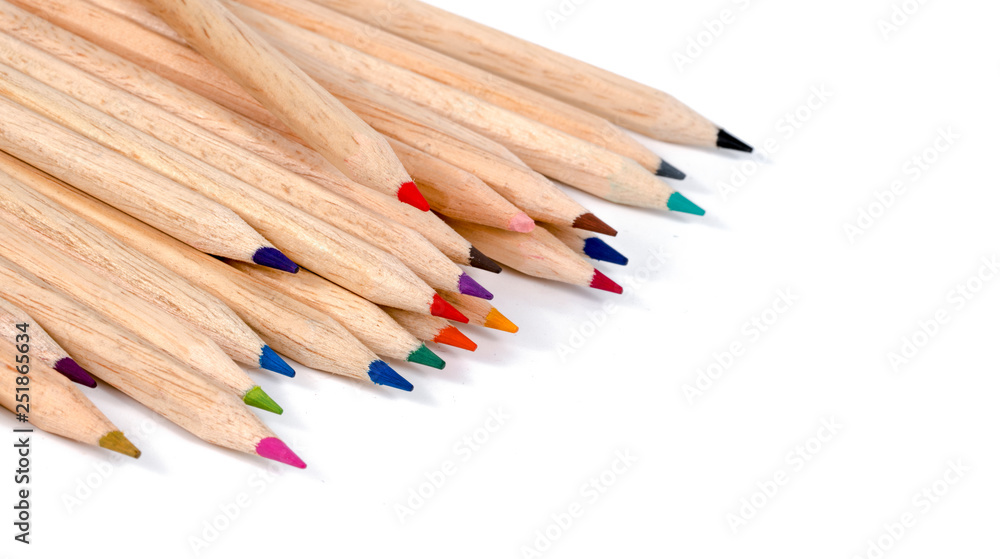 Multiple colored pencils on a white background. Multiple colored pencils on a white background.