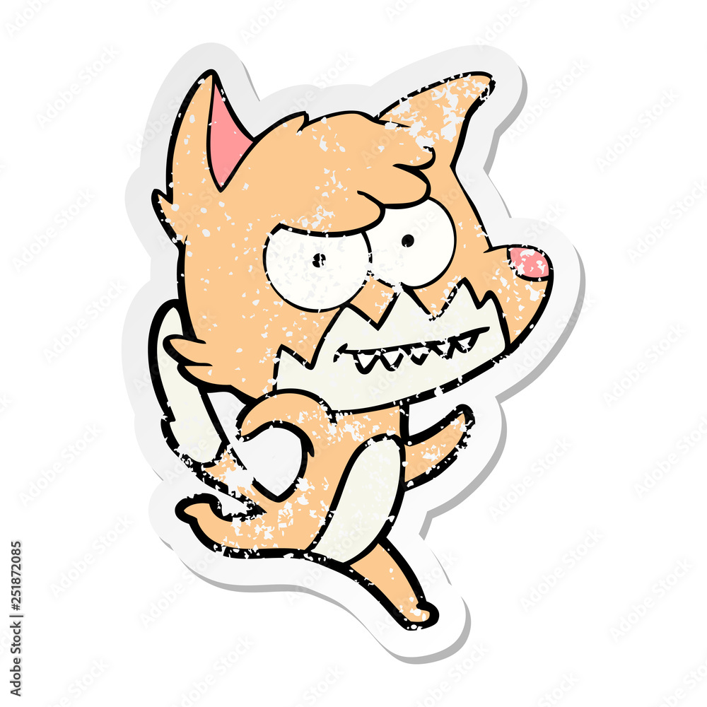 distressed sticker of a cartoon grinning fox