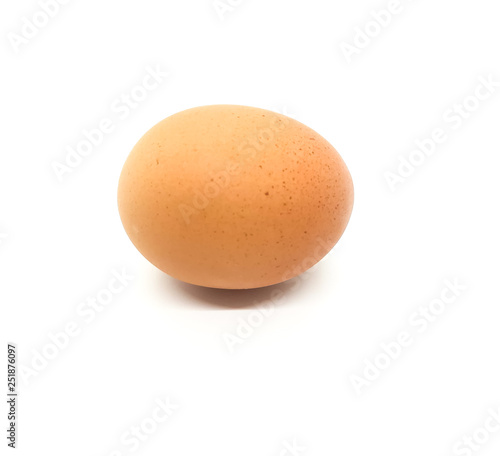 Brown egg with black specks