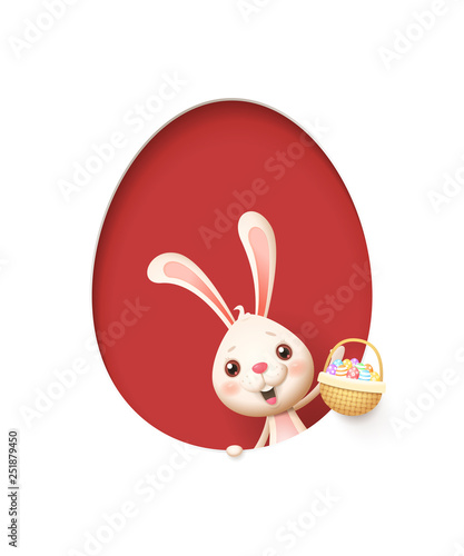 Easter bunny in a egg shaped red hole with a basket filled with decorated eggs - isolated on white