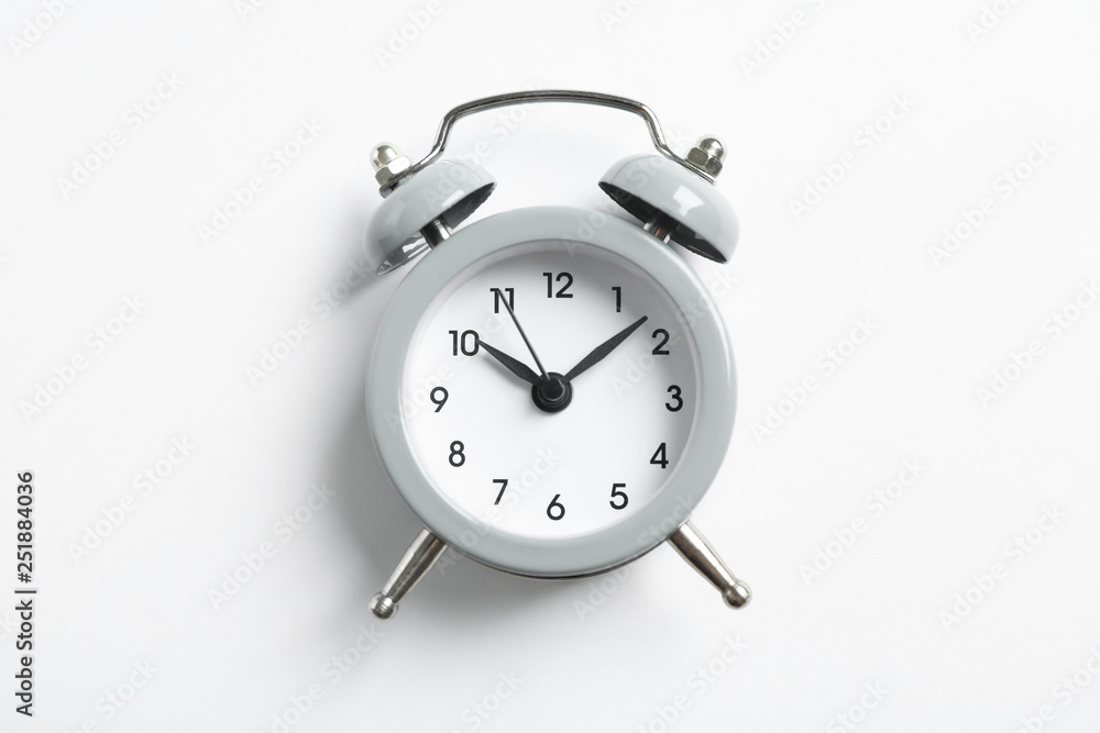 Retro alarm clock on white background, space for text - obrazy, fototapety, plakaty 