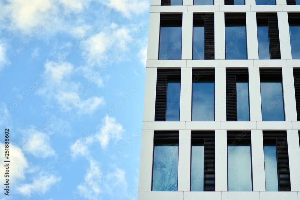 Tthe windows of a modern building for offices Tthe windows of a modern building for offices