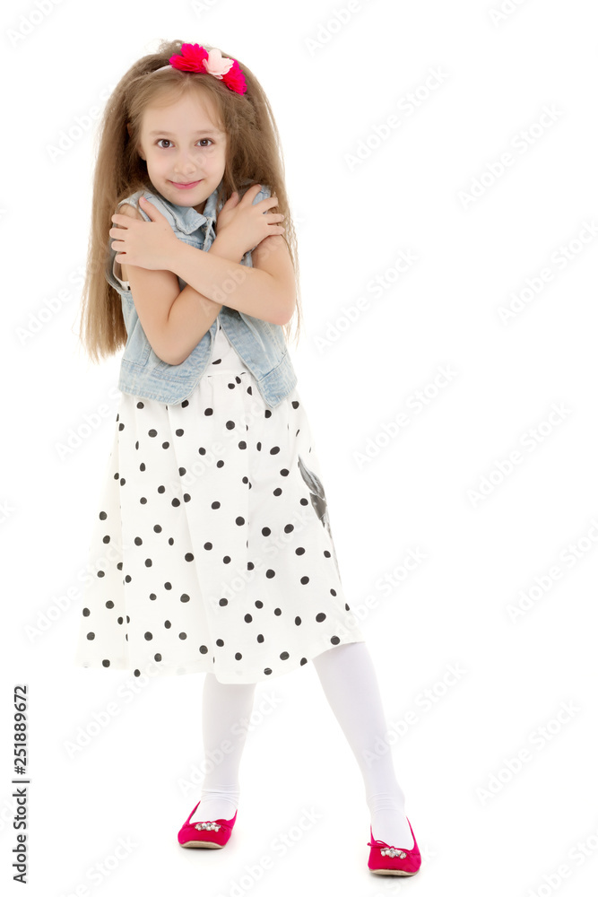 The little girl folded her hands around her face. The little girl folded her hands around her face.