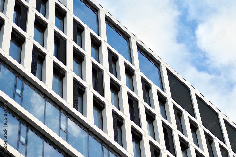 Tthe windows of a modern building for offices Tthe windows of a modern building for offices