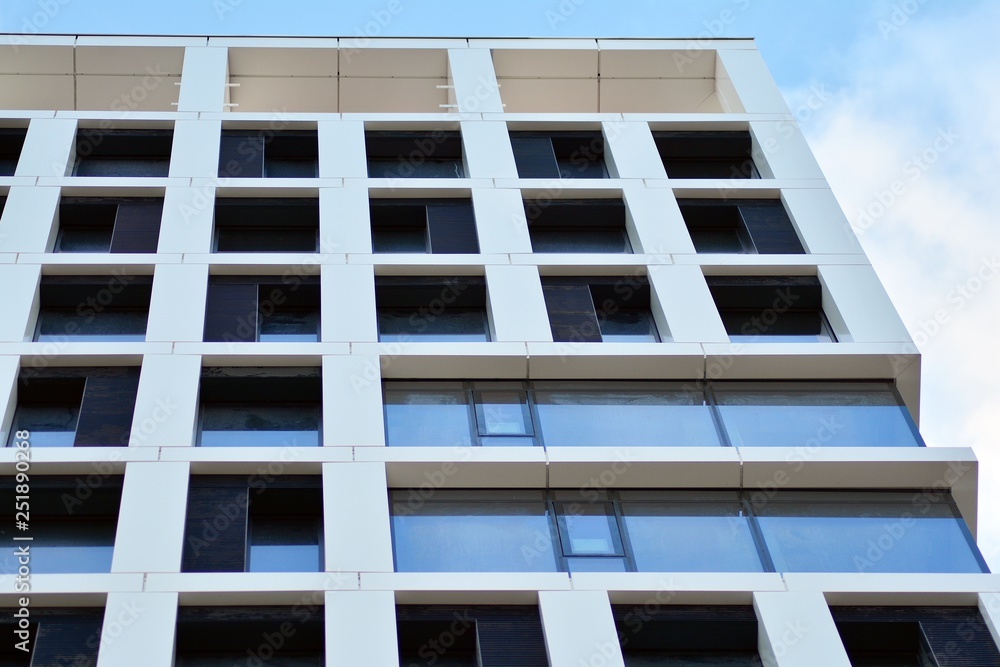 Tthe windows of a modern building for offices Tthe windows of a modern building for offices