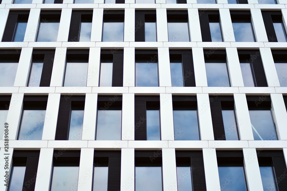Tthe windows of a modern building for offices Tthe windows of a modern building for offices