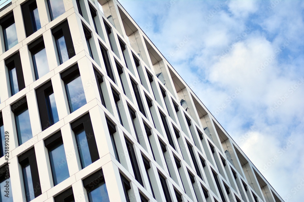 Tthe windows of a modern building for offices Tthe windows of a modern building for offices
