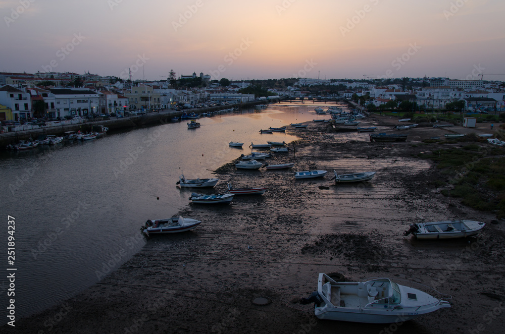 Fishing boats at sunset in Tavira, Algarve, Portugal