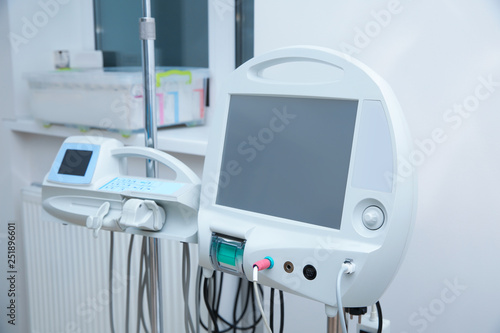 Syringe dispenser system in modern clinic. Surgery equipment