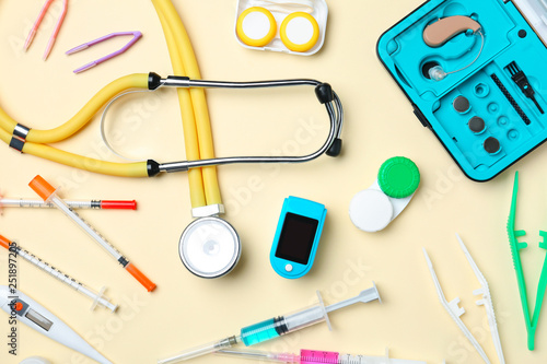 Flat lay composition with medical objects on color background